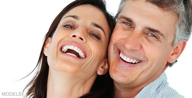 woman and man smiling 